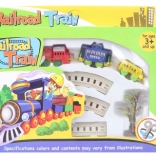 Treinbaanset met opwindspeelgoedlocomotief en 2 wagons