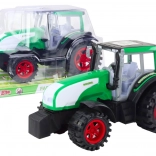 Grote groene boerentractor met vliegwiel