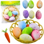 Paasversieringen in een mandje met eieren en wortel 7 stuks
