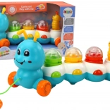 Kleurrijke opwindbare rups met lichten en geluiden