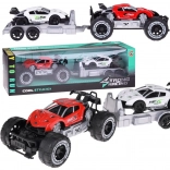 Terreinwagen met aanhanger en sportautootje