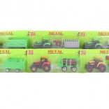 Metalen tractor met aanhanger