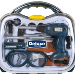 Groene kinderset gereedschap in koffer