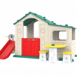 Groot kinderspeelhuis met veranda, glijbaan en groen dak