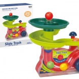 Interactieve fontein met balletjes met geluiden, kleurrijke glijbaan