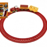 Trein met sleutel en twee wagons en sporen