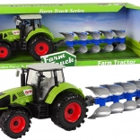 Tractor met ploeg op vliegwiel