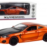 Metalen sportmodel met wrijvingsaandrijving en opengaande elementen 1:24 oranje