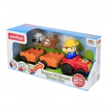 Tractor met aanhanger die speelt en knippert