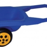 Rood kruiwagentje voor in het zand