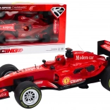 rode raceauto 1:12 met geluiden en lichtjes