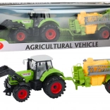 Tractor met lader en sproeier groen