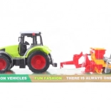 Kunststof tractor met zaaiaanhanger