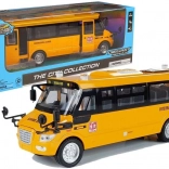 Metalen schoolbus met opwindmotor