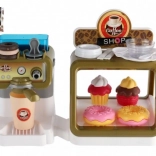 Speelgoedkinderkoffiehuis met koffiezetapparaat en gebakjes